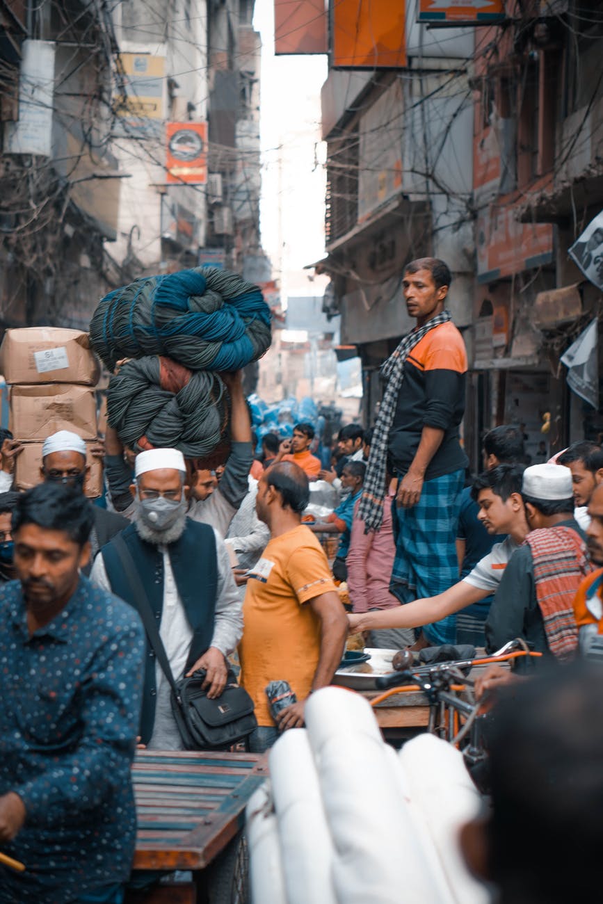 people walking on busy street in asia